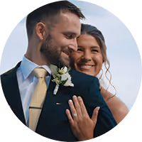 Spencer and Mitchell smiling cheek to cheek at their Montana wedding